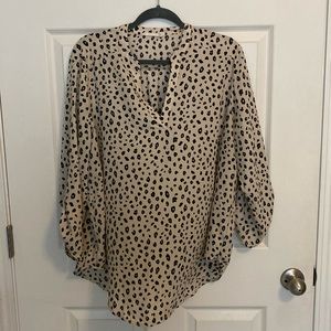 Leopard print blouse.